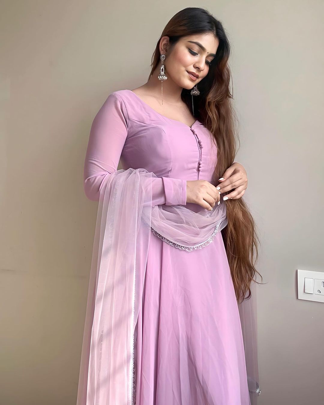 Kanak Mishra In Onion Color Anarkali Three Piece Suit
