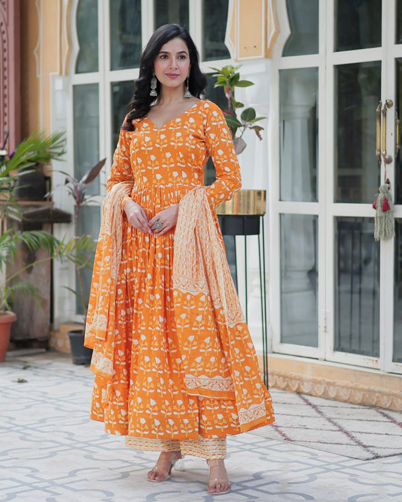 Orange color printed pure cotton three piece kurti suit