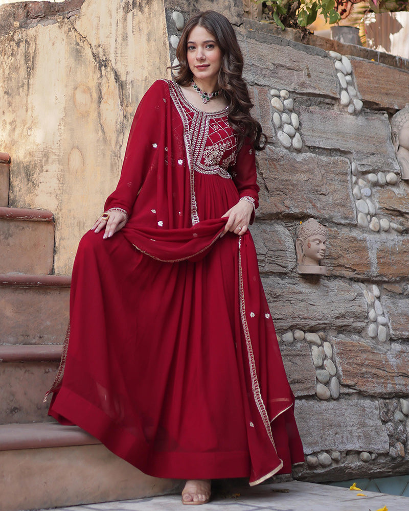 Maroon color faux blooming embroidered gown with dupatta