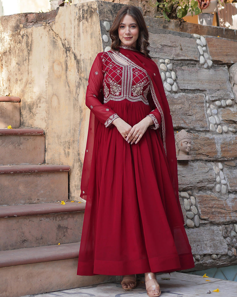 Maroon color faux blooming embroidered gown with dupatta