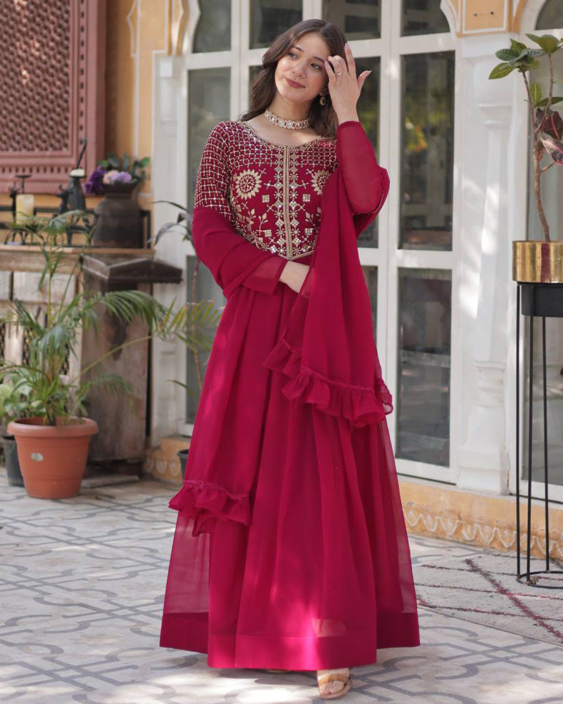 Rani pink color faux blooming georgette gown with embroidered dupatta