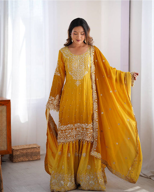 Yellow color chinnon sequence work plazzo suit