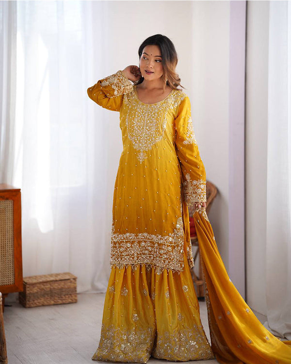 Yellow color chinnon sequence work plazzo suit