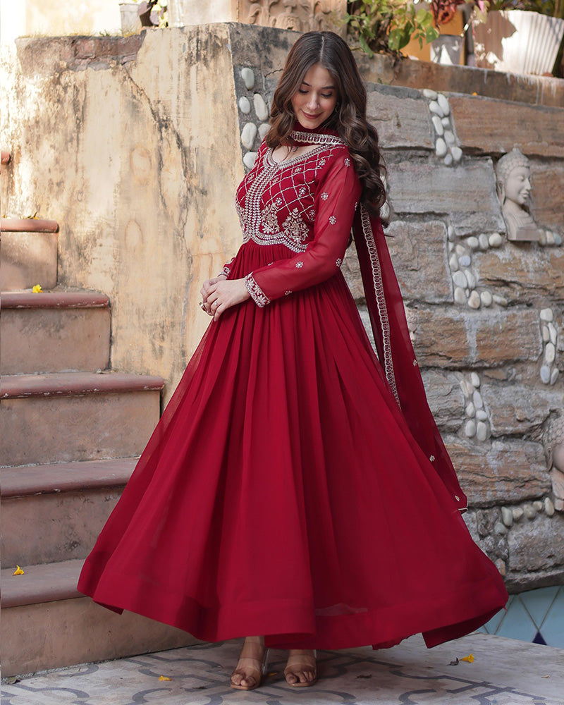 Maroon color faux blooming embroidered gown with dupatta