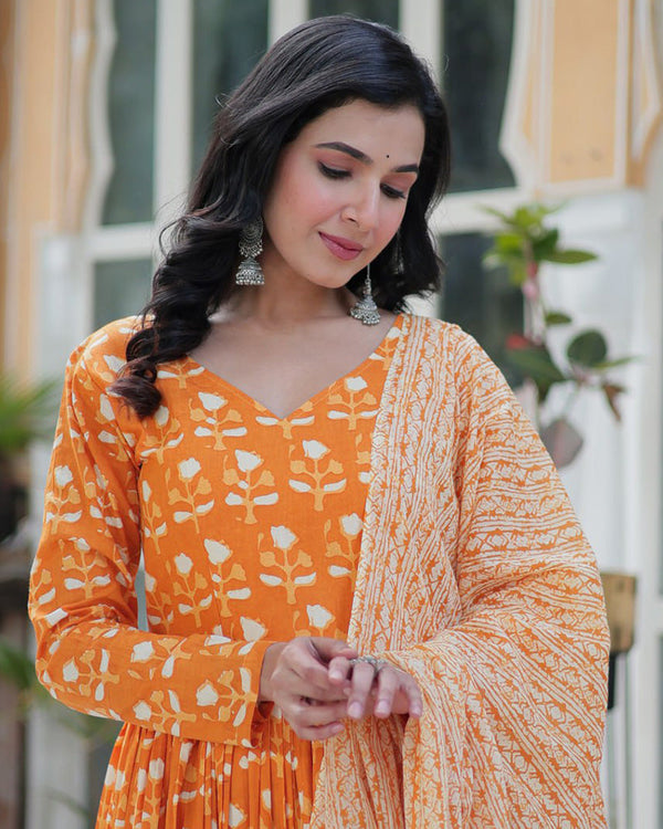 Orange color printed pure cotton three piece kurti suit