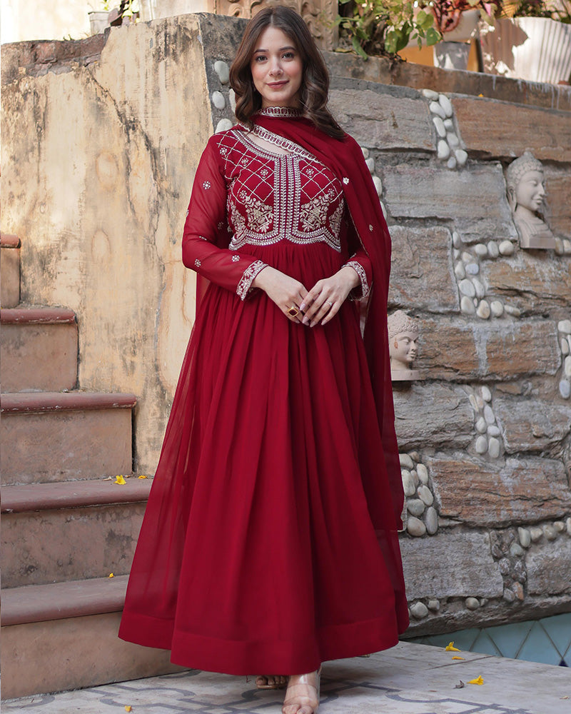 Maroon color faux blooming embroidered gown with dupatta