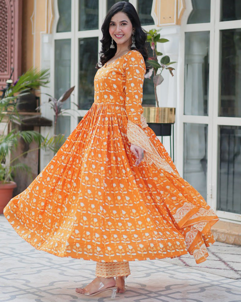 Orange color printed pure cotton three piece kurti suit