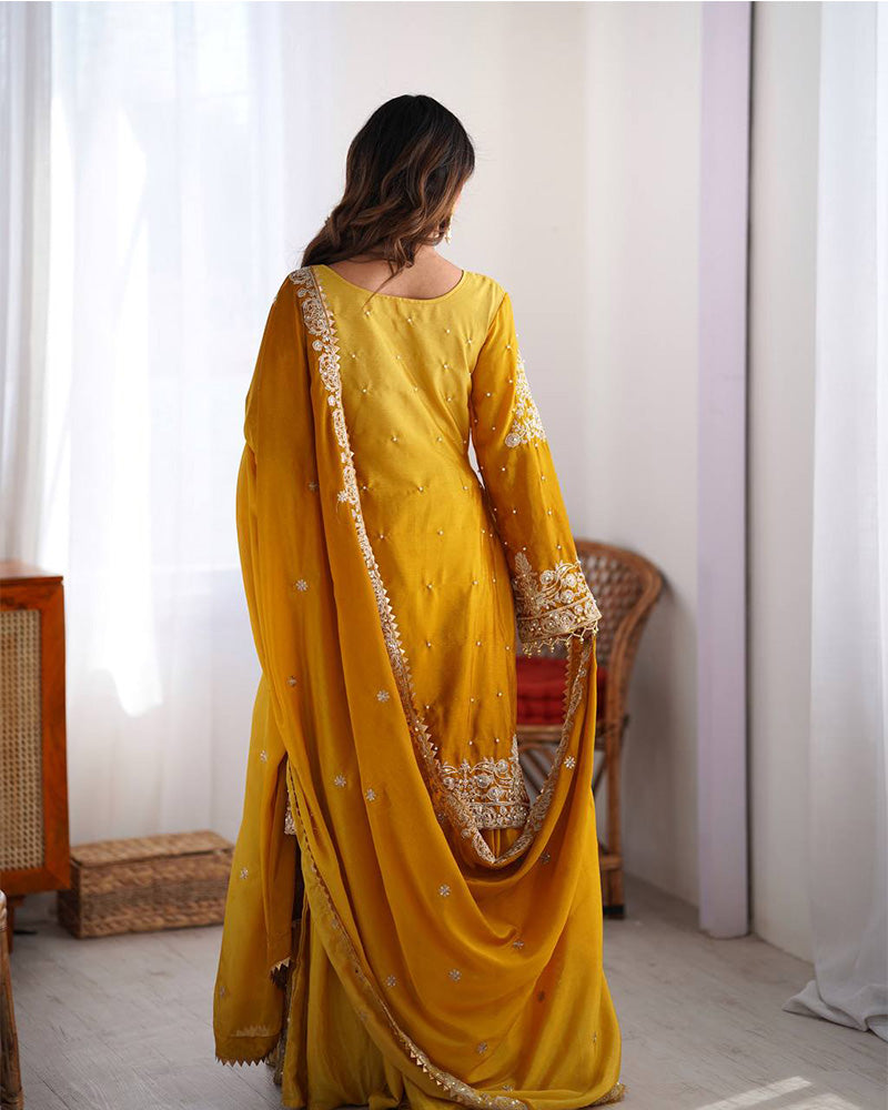 Yellow color chinnon sequence work plazzo suit