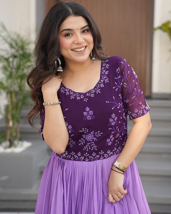 Purple color faux blooming embroidered work gown