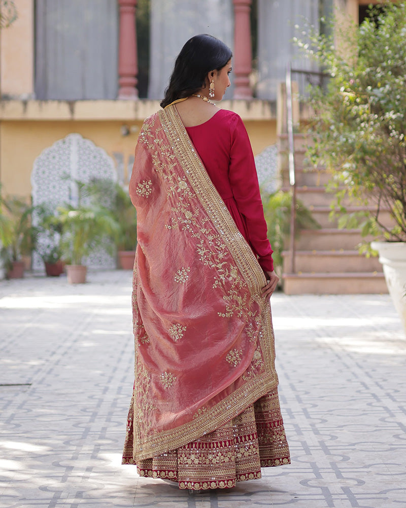 Beautiful rani pink color shimmer gown with embroidered dupatta