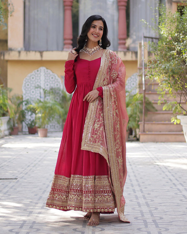 Beautiful rani pink color shimmer gown with embroidered dupatta