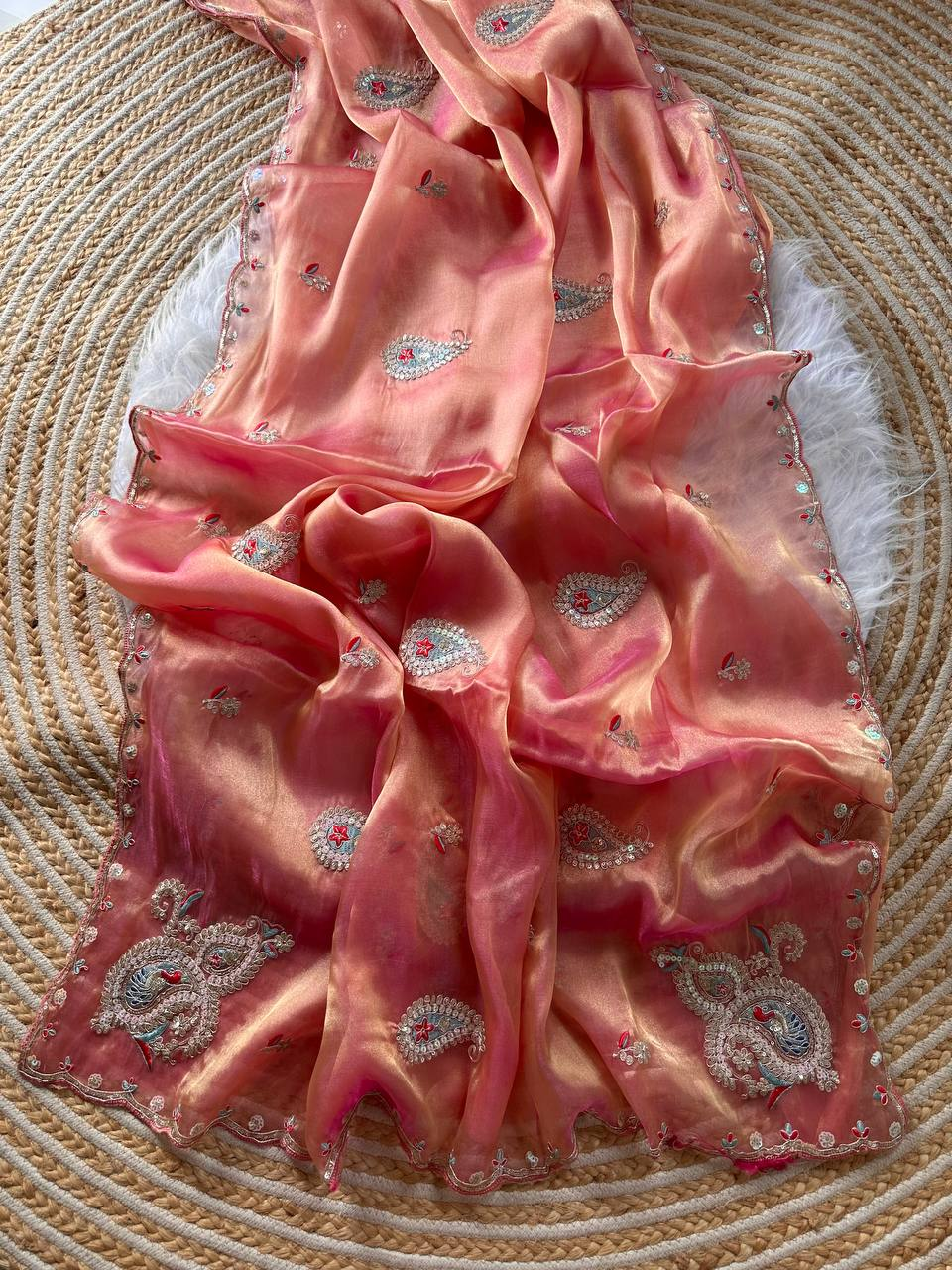 Coral Pink Super Soft Simmer Tissue Saree with Codding Sequins Embroidery & Peacock Paisley Butta