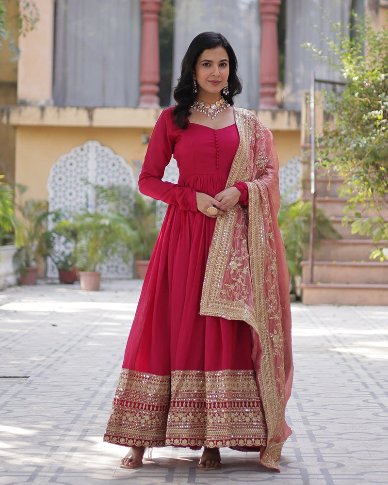 Beautiful rani pink color shimmer gown with embroidered dupatta