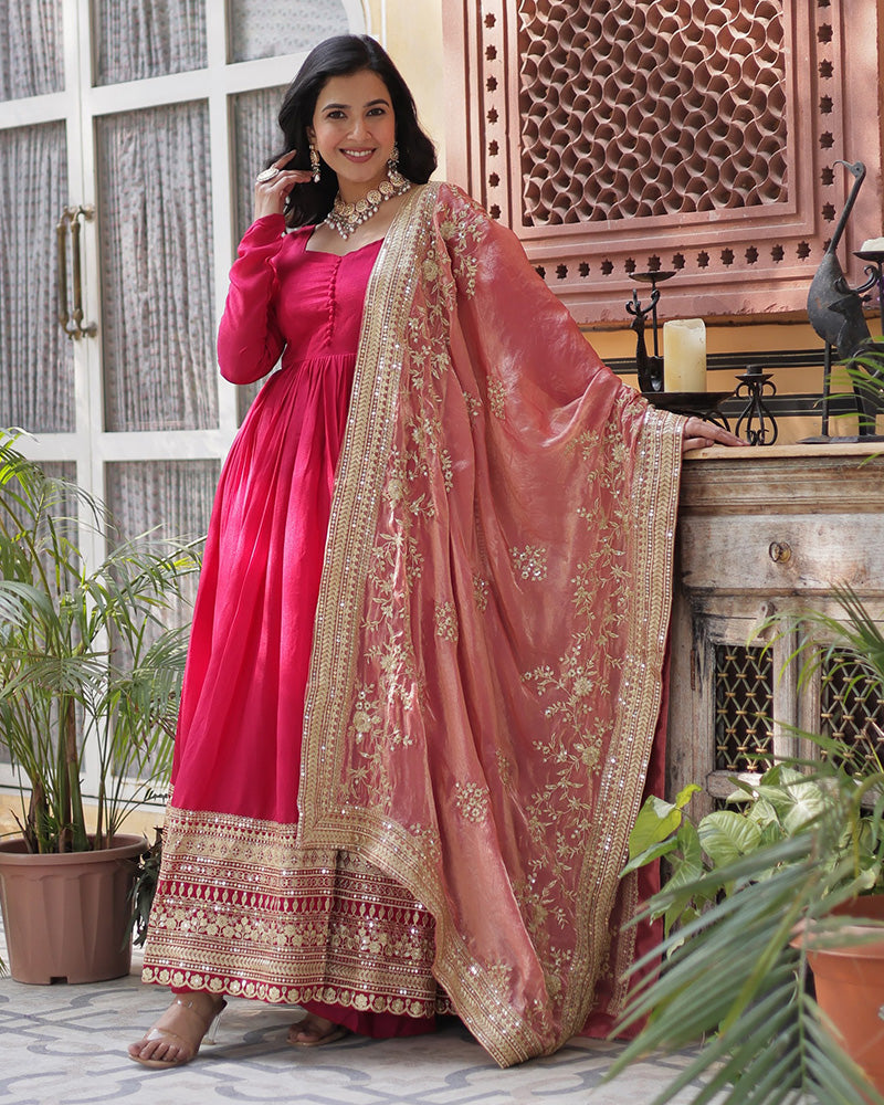 Beautiful rani pink color shimmer gown with embroidered dupatta