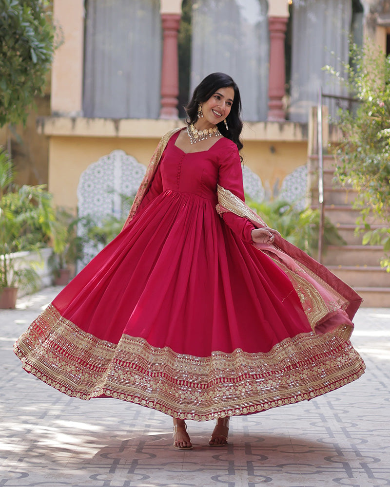 Beautiful rani pink color shimmer gown with embroidered dupatta