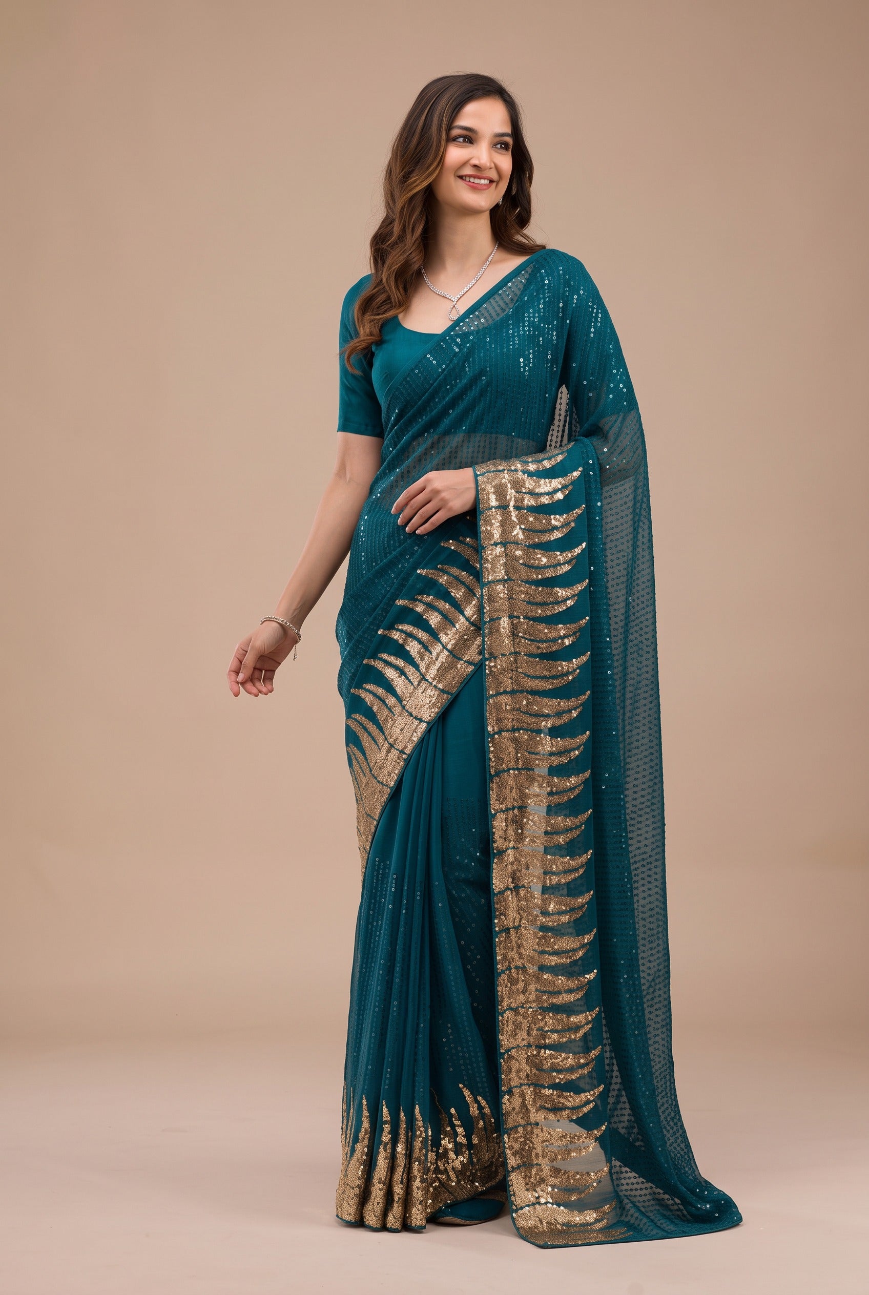 Teal Blue Georgette Designer Saree with Statement Gold Sequin Pallu