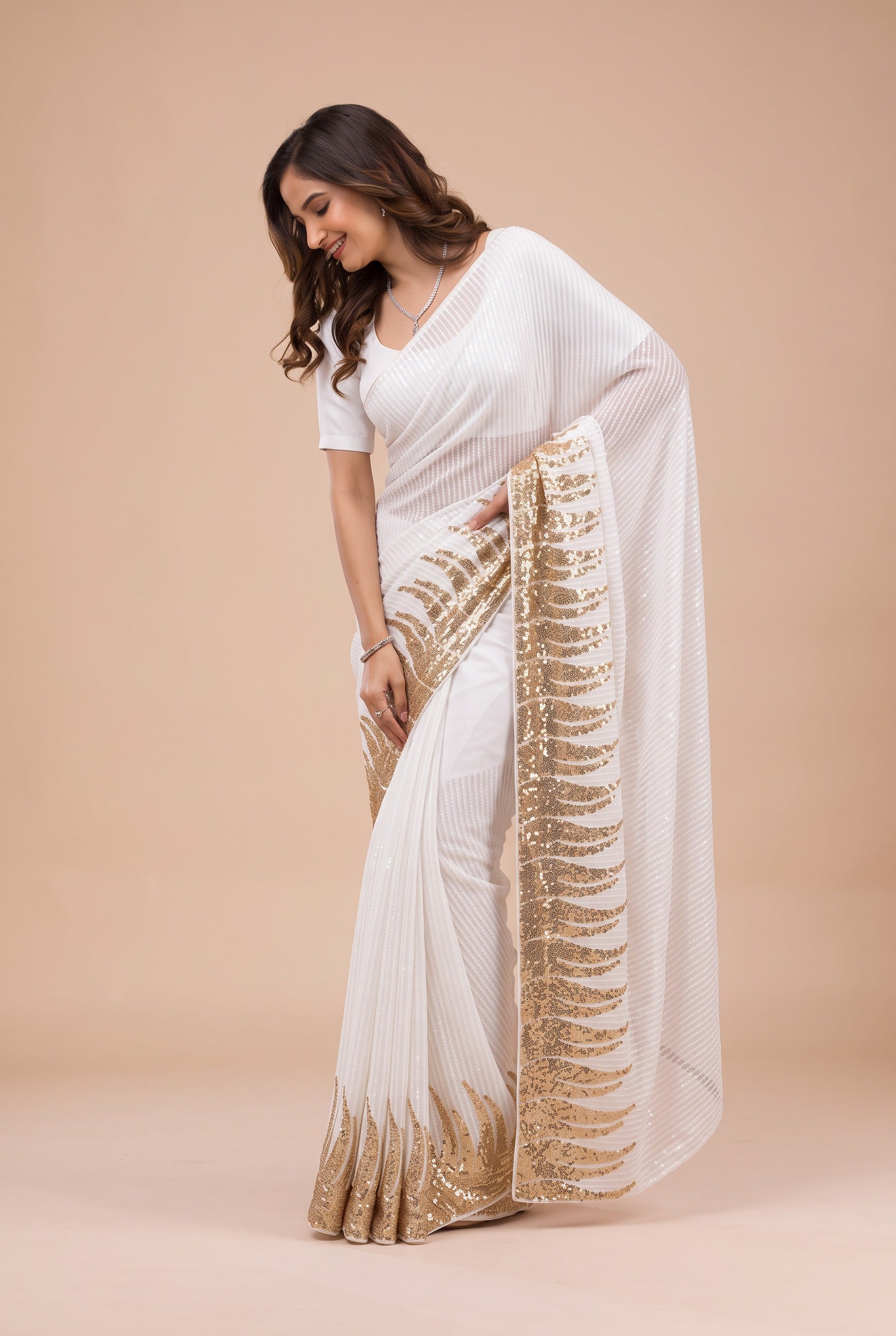 Pearl White Georgette Saree with Gold Sequin Feather Edge