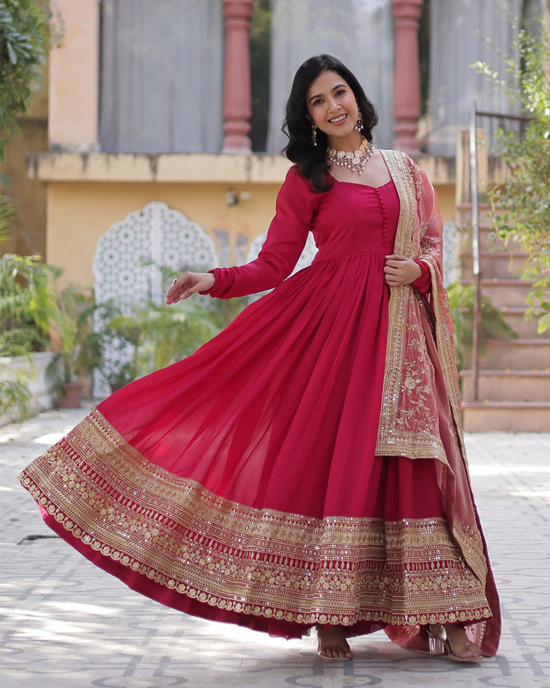 Beautiful rani pink color shimmer gown with embroidered dupatta