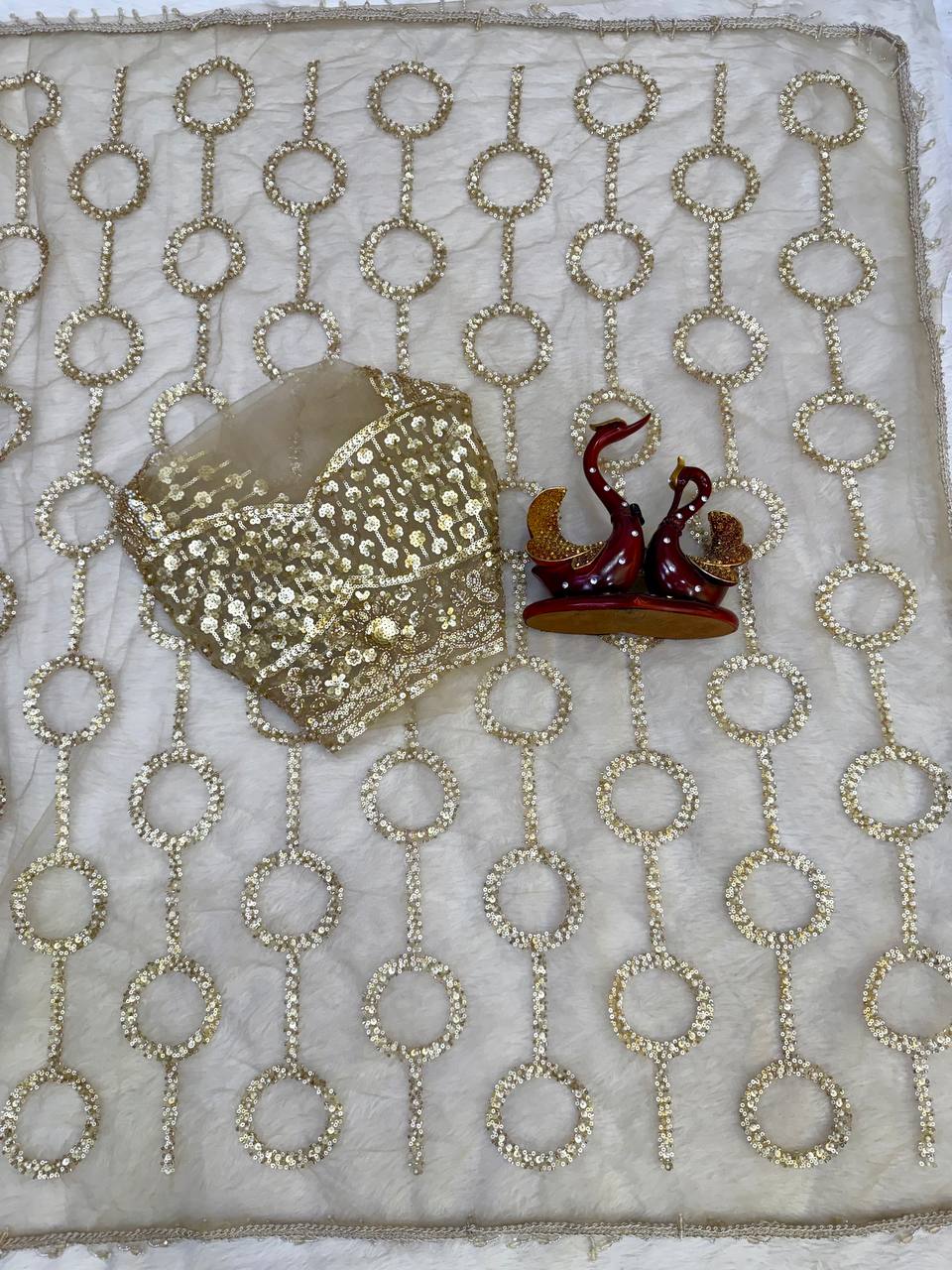 Beige Net Saree with All-Over Gold Ring Beads Embroidery Work