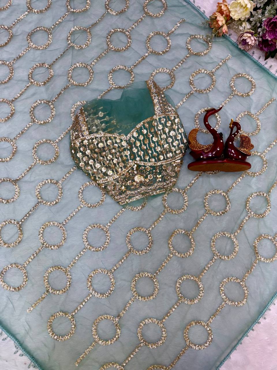 Sea Green Net Saree with Golden Circular Pattern Beads and Stone Work