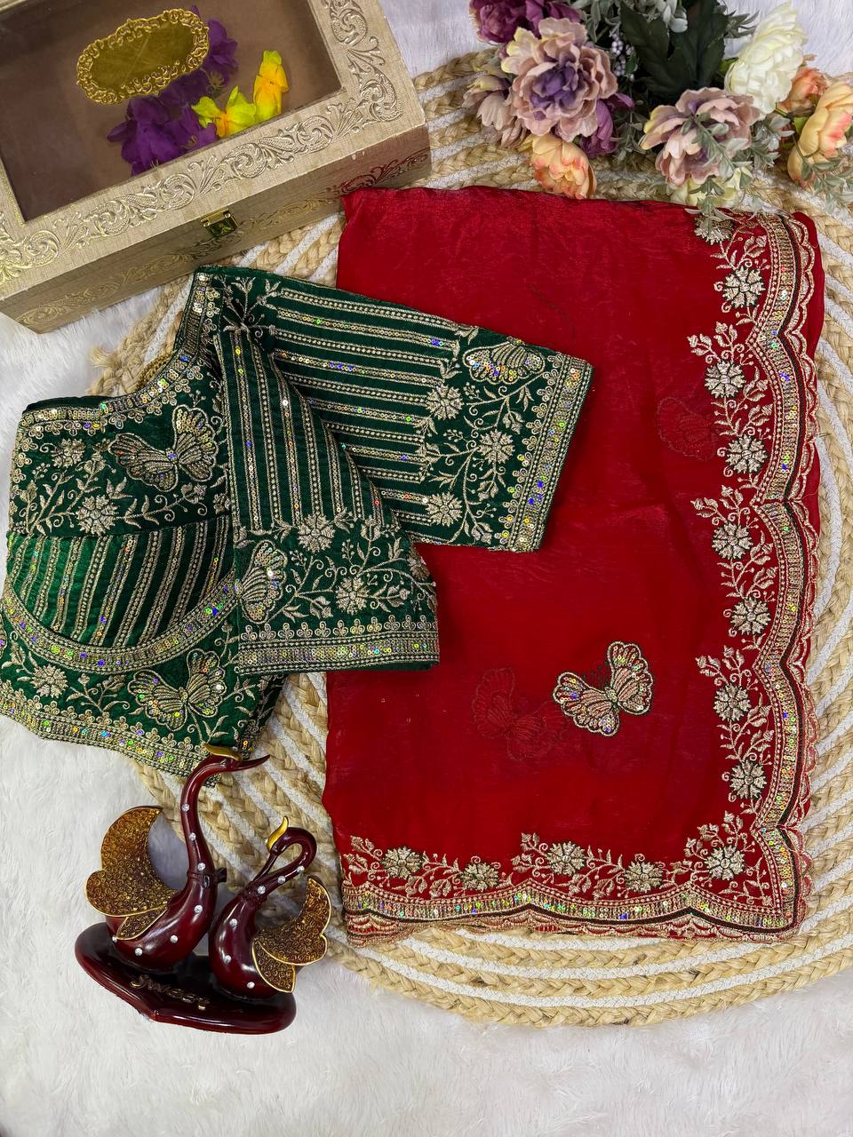 Red Fandy Silk Saree Featuring Butterfly Motifs & Green Embroidered Blouse