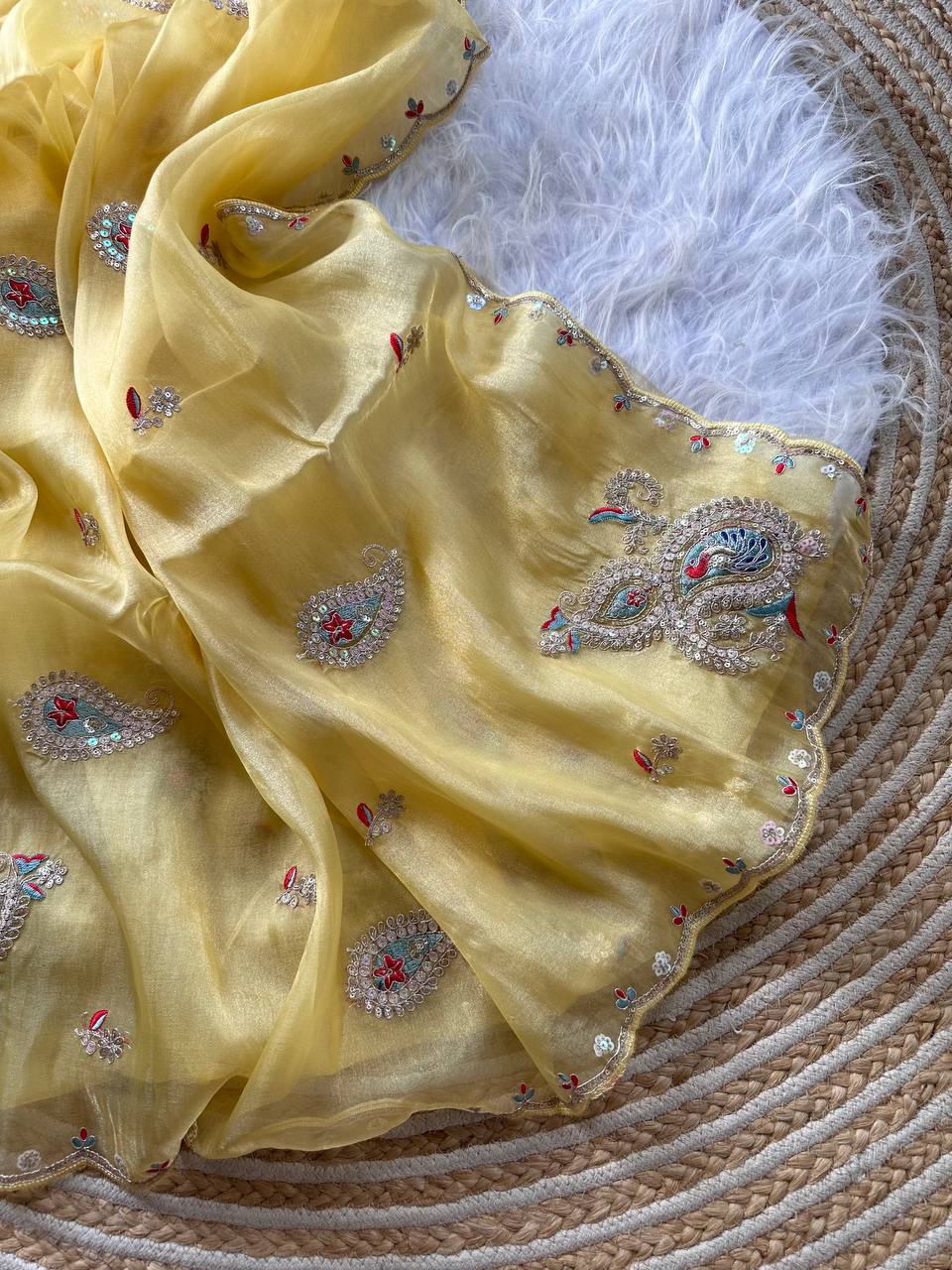 Yellow Super Soft Simmer Tissue Saree with Codding Sequins Embroidery & Peacock Paisley Butta