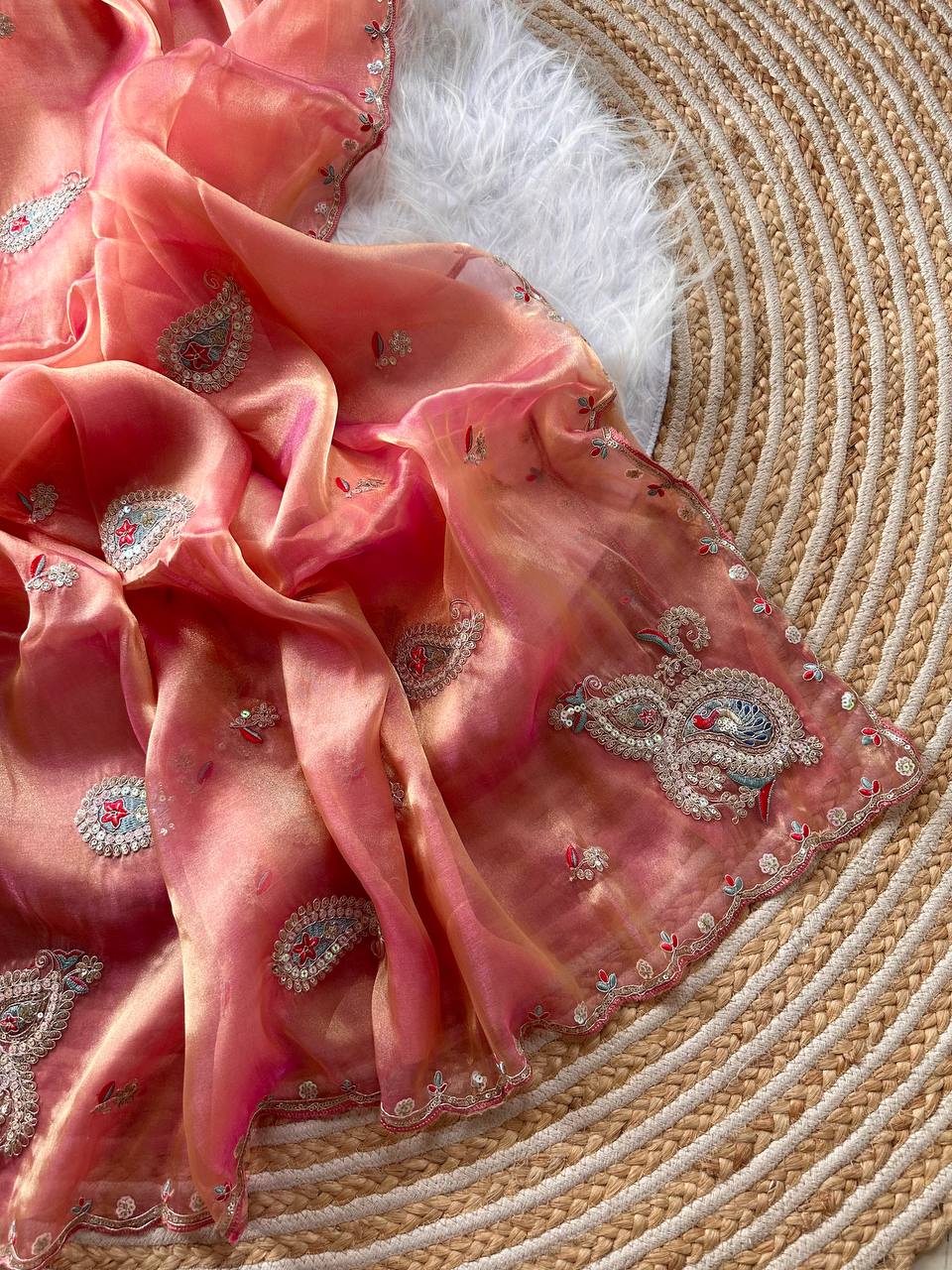 Coral Pink Super Soft Simmer Tissue Saree with Codding Sequins Embroidery & Peacock Paisley Butta