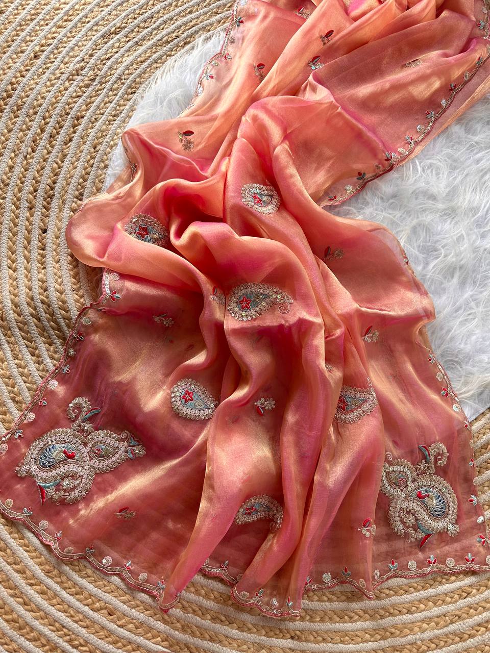 Coral Pink Super Soft Simmer Tissue Saree with Codding Sequins Embroidery & Peacock Paisley Butta