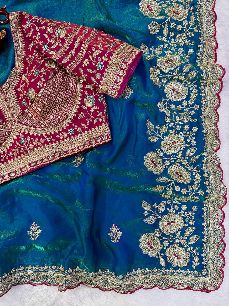 Peacock Teal Embroidered Saree with Contrast Magenta Heavy Blouse Piece