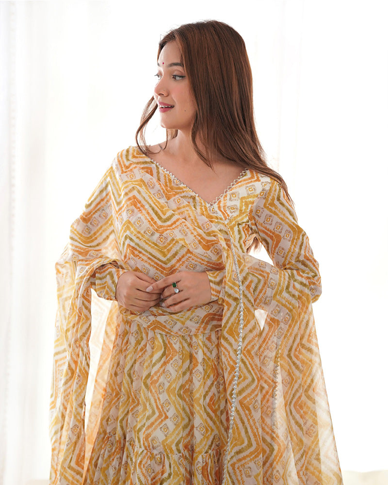 OFF-WHITE COLOR SOFT GEORGETTE THREE LAYER RUFFLE STYLE ANARKALI SUIT