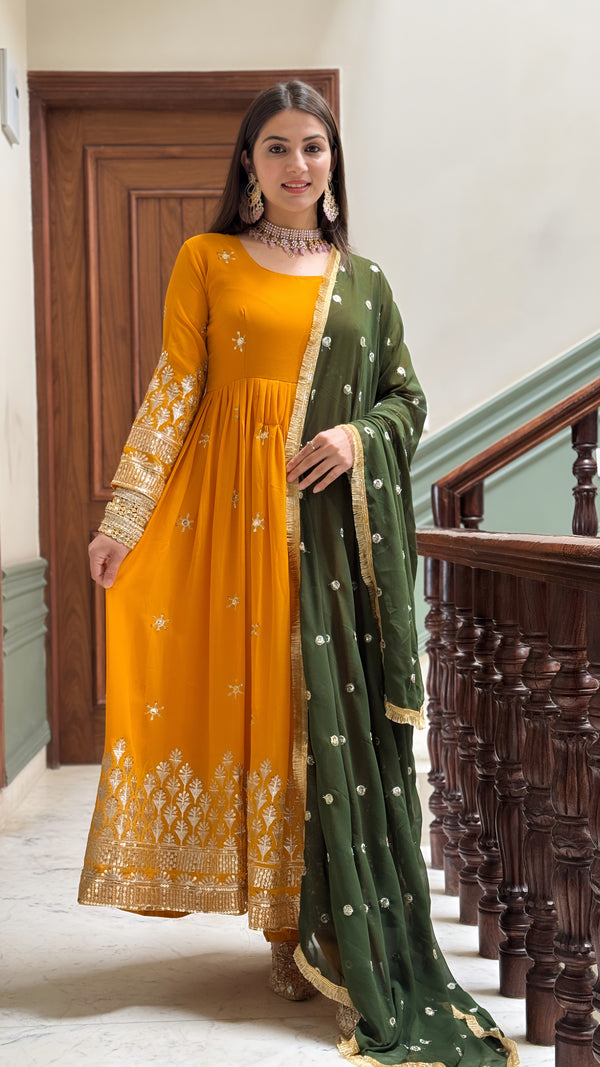 Rajni Samta Haldi Ceremony Wear Mustered Color Anarkali Gown With Dupatta