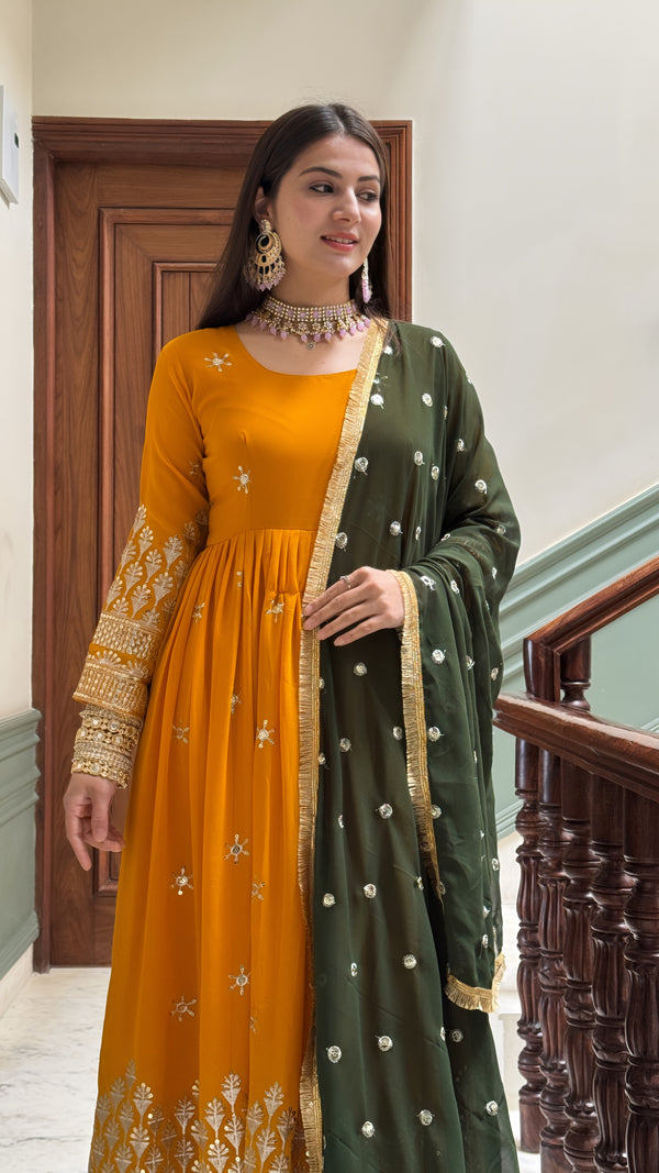 Rajni Samta Haldi Ceremony Wear Mustered Color Anarkali Gown With Dupatta