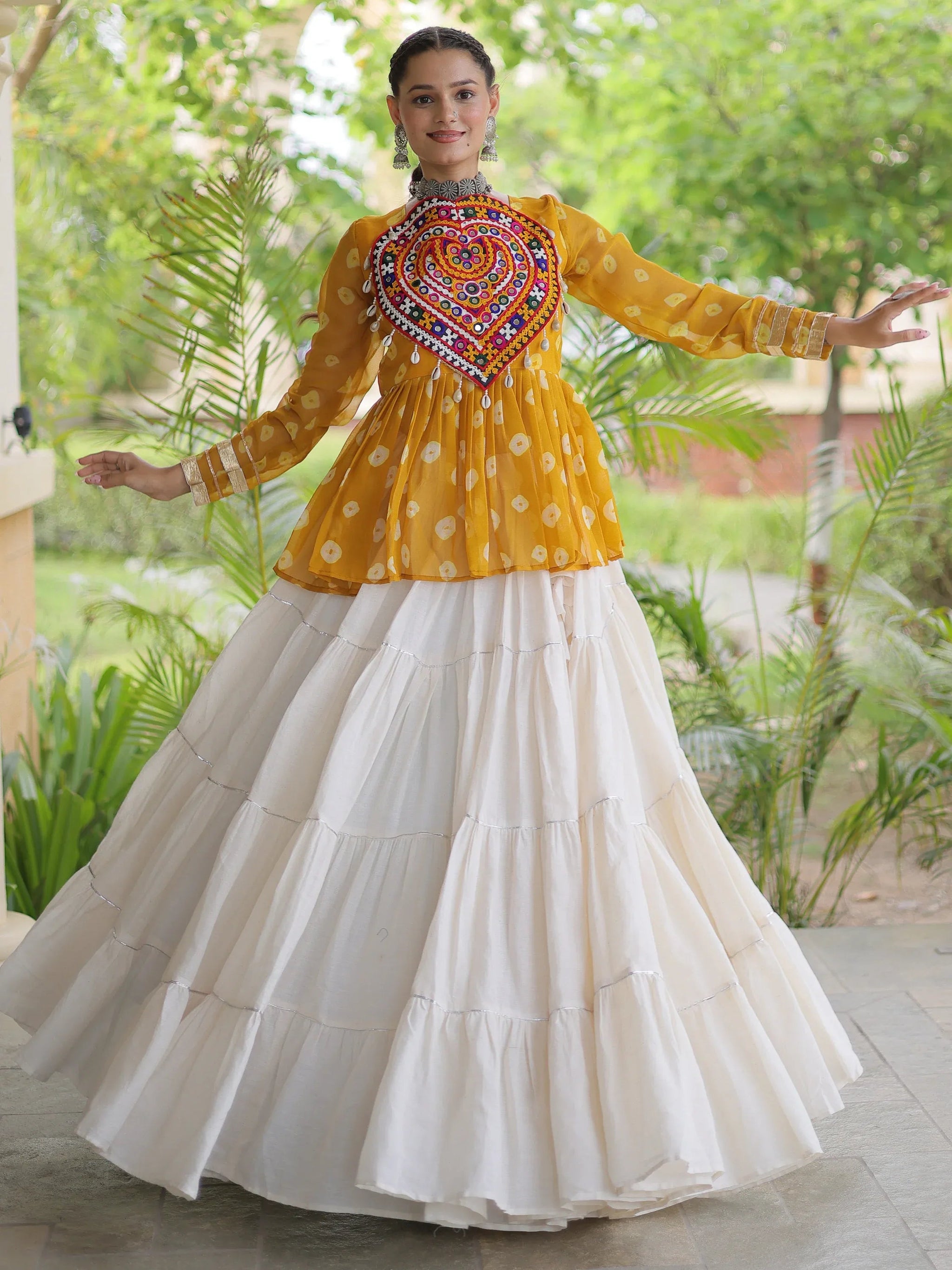 Pretty Mustard Yellow Cotton Navratri Lehenga With Patch Work Peplum Top