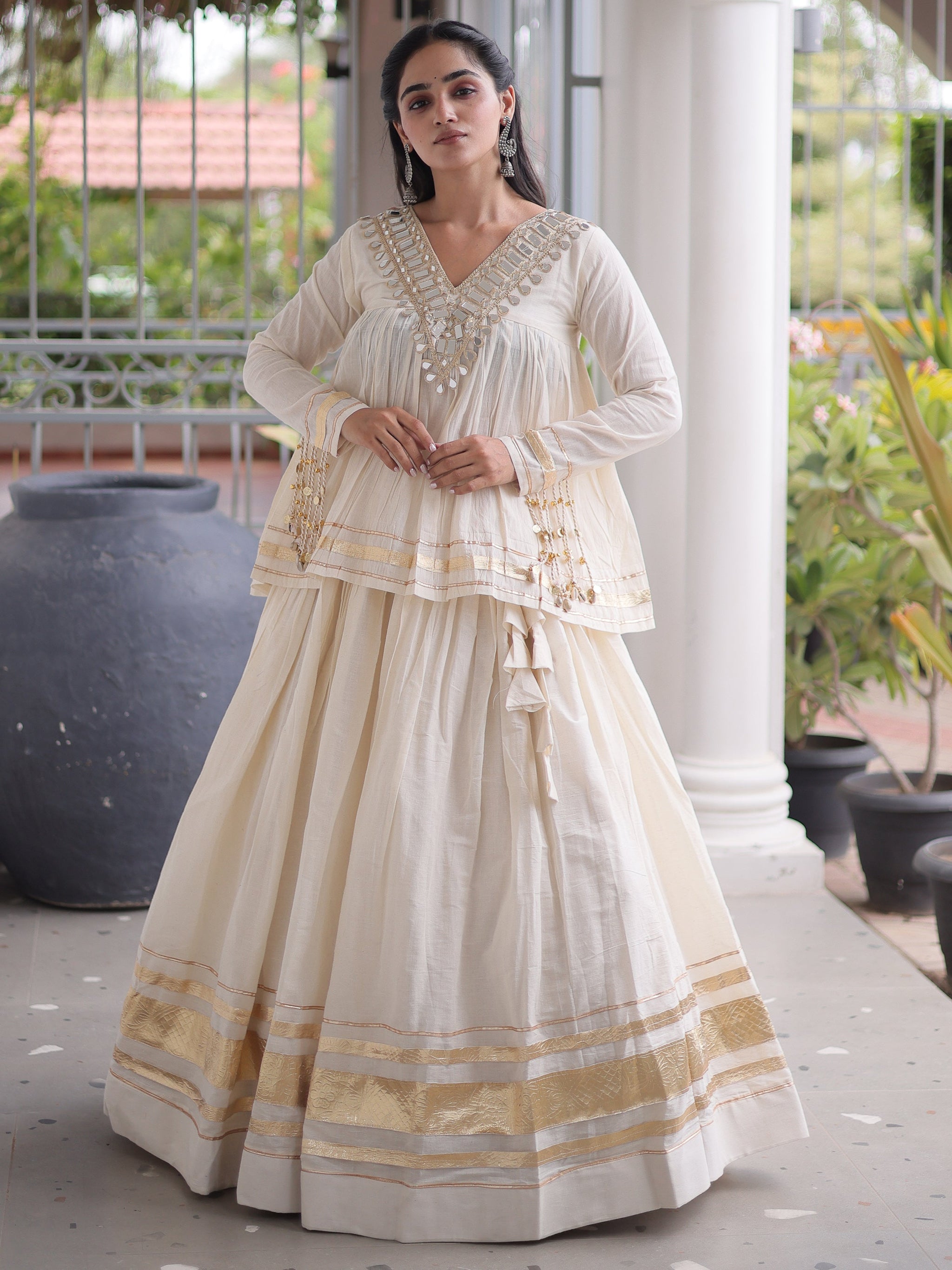 Alluring White Mirror Laced Navratri Wear Lehenga With Peplum Top