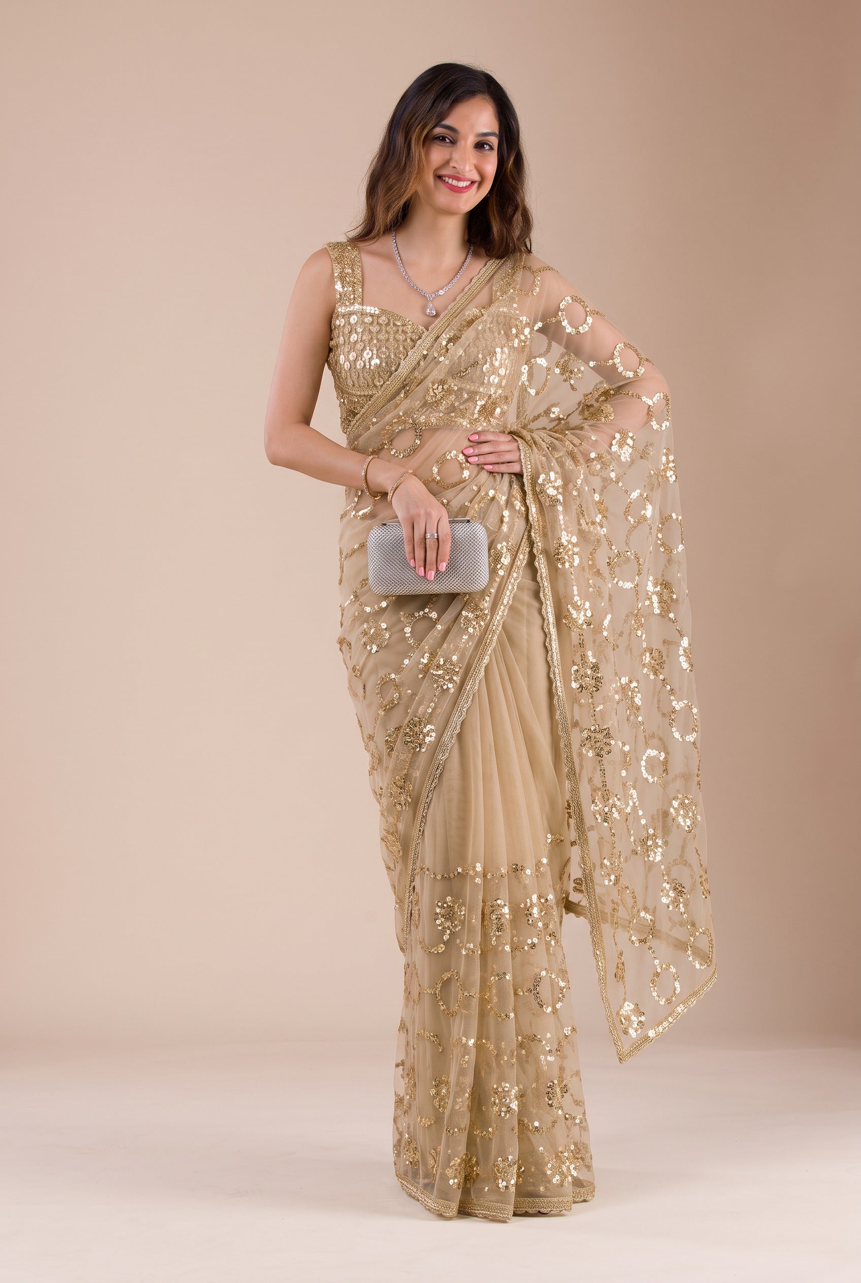 Beige Net Saree with All-Over Gold Ring Beads Embroidery Work