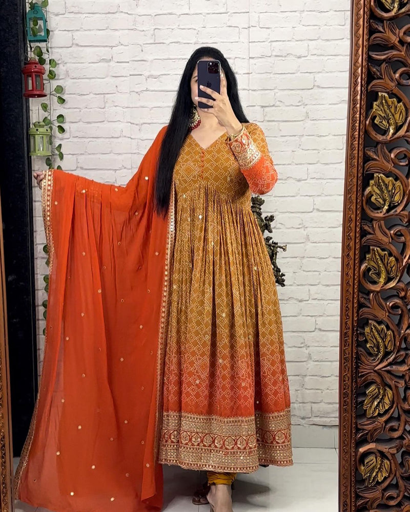 Unique Orange Color Embroidered With Digital Print Gown