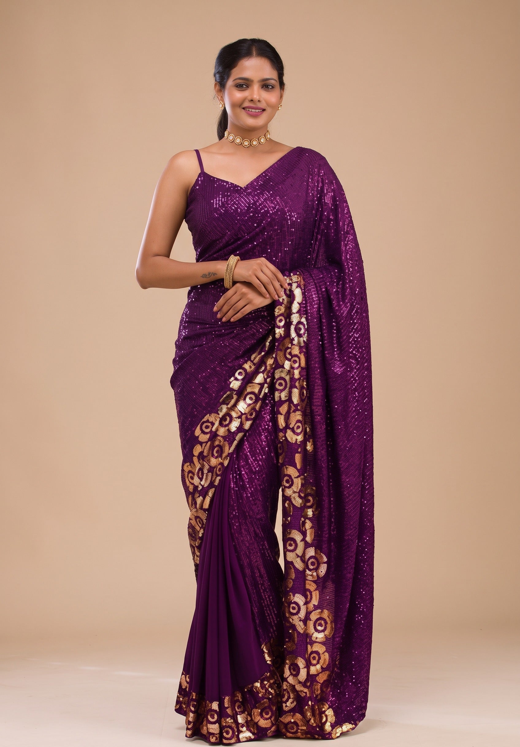 Deep Plum Purple Sequined Festive Saree with Intricate Gold Motif Border
