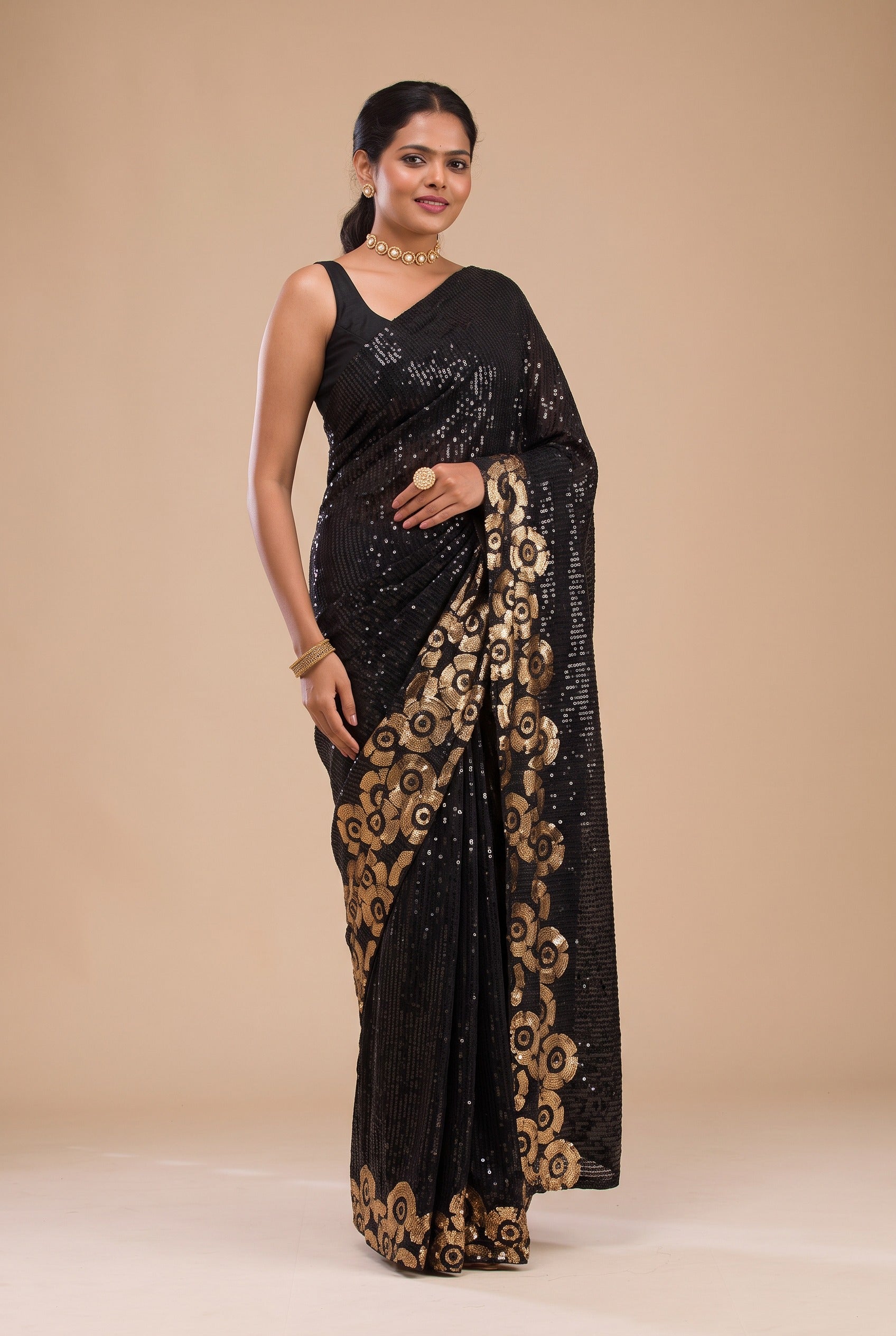 Jet Black All-Over Sequence Work Saree with Contrast Gold Floral Border